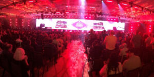 A Crowd Of People In A Room