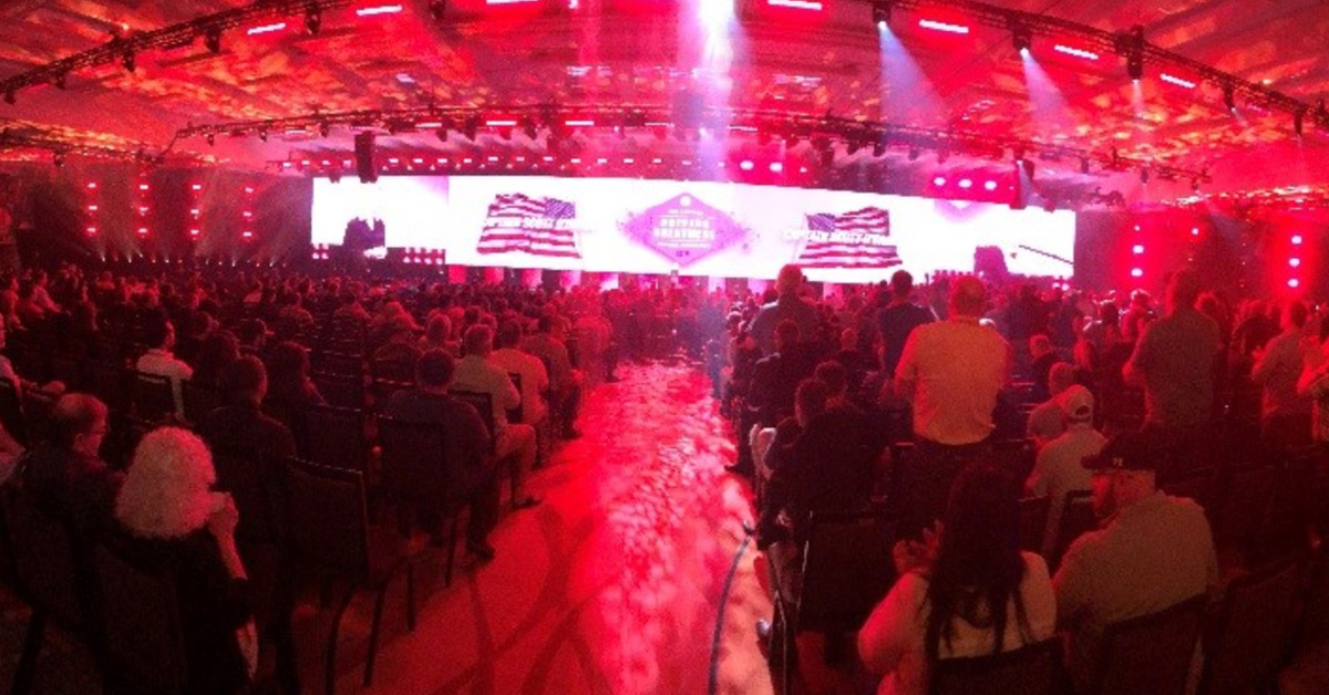 a crowd of people in a room