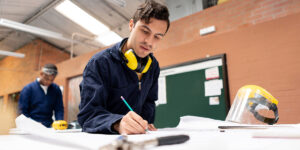 A Person Sitting On A Table