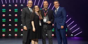 A Group Of People Posing For The Camera