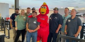 A Group Of People Posing For The Camera